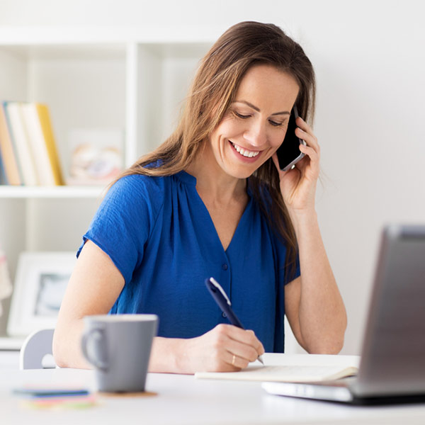 Woman using phone to call for service